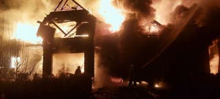 Ukrainian rescuers working at the site where a Russian shock drone hit a private building in Kryukivshchyna village of Kyiv's area